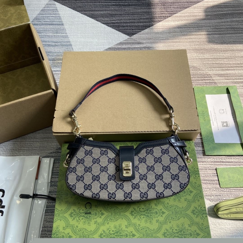 G*u*i top handle bags